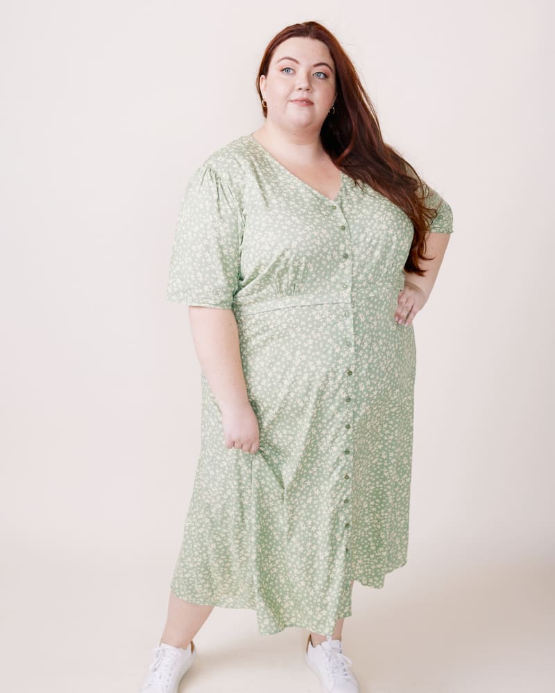 Front of a model wearing a size XL Amelia Midi Dress in Jade Blossom by ABLE. | dia_product_style_image_id:271522